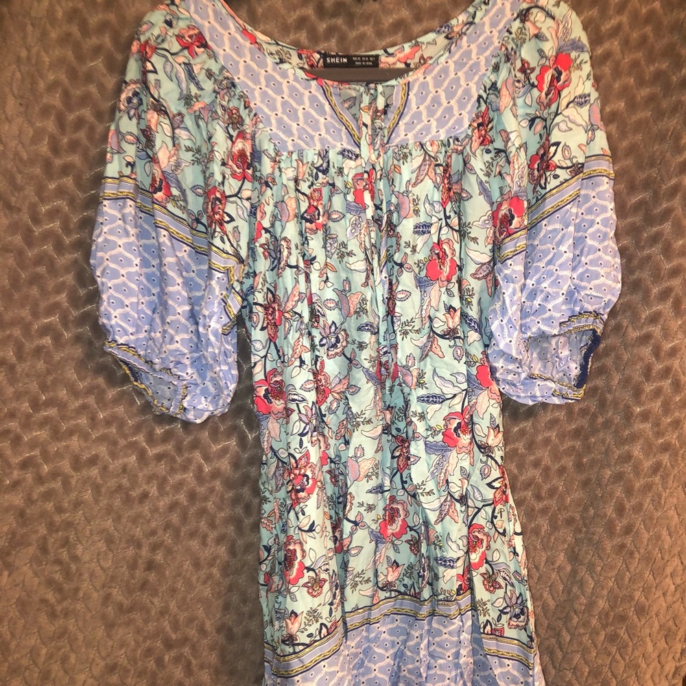 Dress, good length inch above the knee if jut a little more.